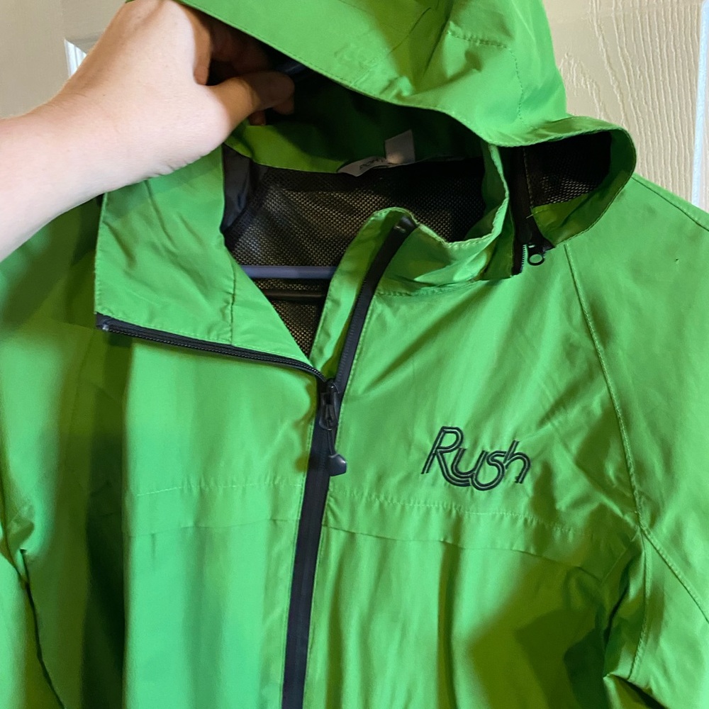 Green Hooded rain jacket